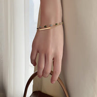 Bracelet double avec charms