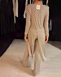 Costume élégant fendu à pois