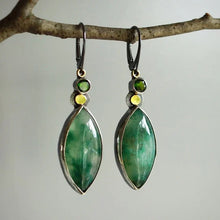 Boucles d'oreilles vintage avec pierre verte