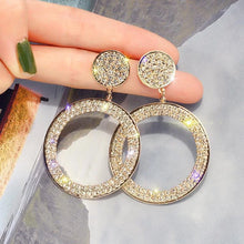 Boucles d'oreilles en zirconium en or et en argent