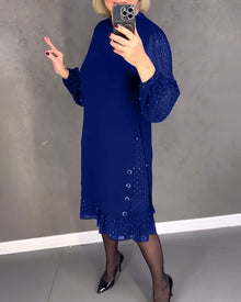 Robe élégante à pois et manches longues