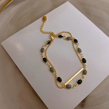 Bracelet double avec charms