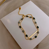 Bracelet double avec charms