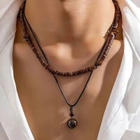 Collier de luxe pour homme avec des perles en turquoise et en œil de tigre