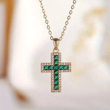 Collier en or avec pendentif croix émeraude solennelle