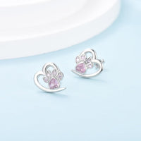 Boucles d'oreilles avec patte et cœur en zircon