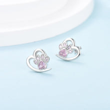 Boucles d'oreilles avec patte et cœur en zircon