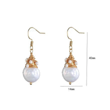 Boucles d'oreilles rétro avec perles d'eau douce en format spécial