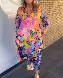 Robe à col en V à imprimé cœur avec manches longues