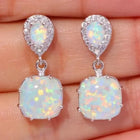Boucles d'oreilles vintage en opale blanche et zircon