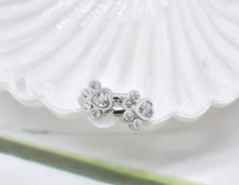 Boucles d'oreilles Étreinte de Pattes avec zirconium brillant