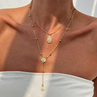 COLLIER CROIX DE DIAMANT ET COULEURS