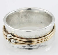 Bague vintage dorée avec couches argentées