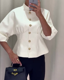Manteau élégant à simple boutonnage de couleur unie