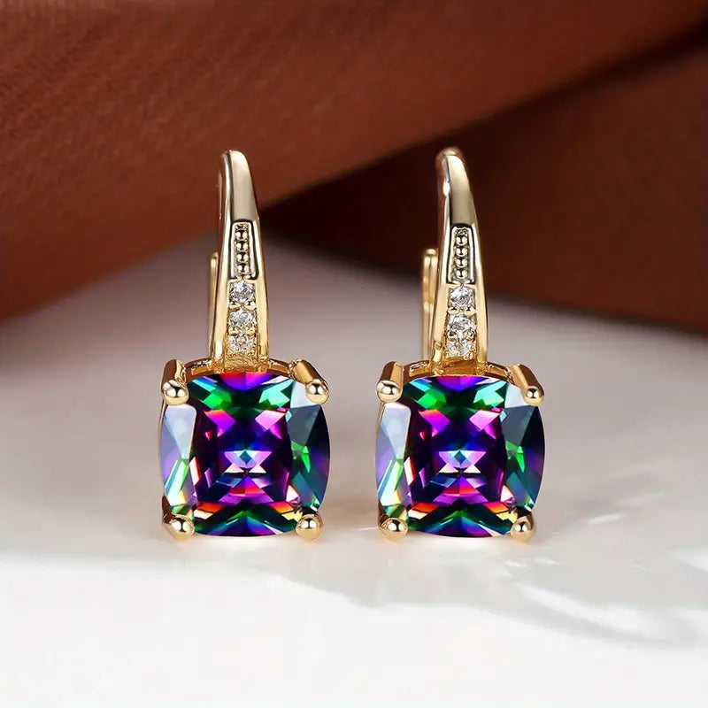 Boucles d'oreilles en anneau doré avec pierre mystique
