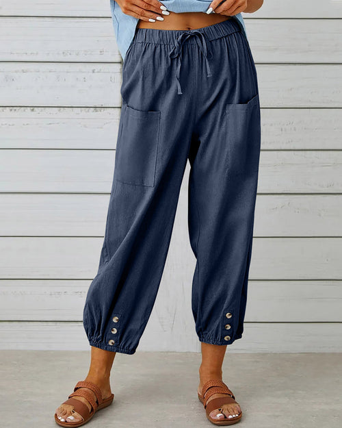 Pantalon taille haute bouton neuf points