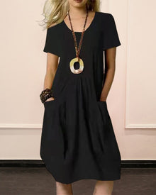 Robe unie col rond manches courtes