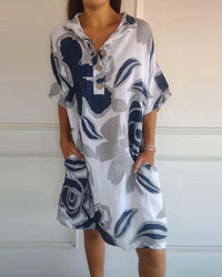 Robe à poches à revers et imprimé floral