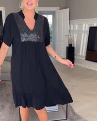 Robe ample plissée col V