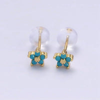 Boucles d'oreilles à clou avec délicate fleur