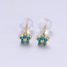 Boucles d'oreilles à clou avec délicate fleur
