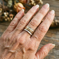 Bague vintage fine rotative en doré et argenté