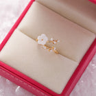 Bague ajustable avec fleur sauvage et zirconia en or