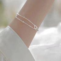 Bracelet ajustable en argent avec cœur