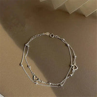 Bracelet ajustable en argent avec cœur
