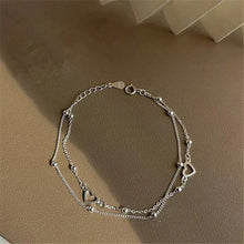 Bracelet ajustable en argent avec cœur