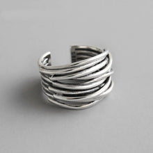 Bague ajustable en couches argentées