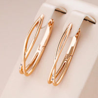 Boucles d'oreilles élégantes plaquées or avec croix