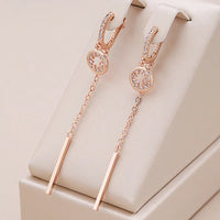 Boucles d'oreilles en sequins dorés
