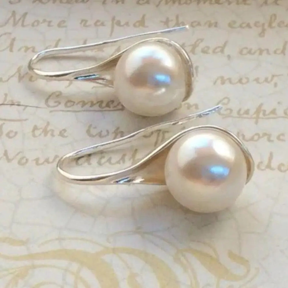 Boucles d'oreilles élégantes avec perles en forme de goutte