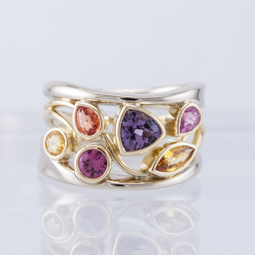 Bague vintage en or et argent avec zircon multicolore