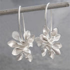 Boucles d'oreilles vintage en argent avec des fleurs irrégulières