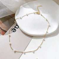 Collier petit de perles en or
