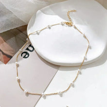 Collier petit de perles en or