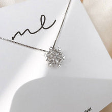Collier en cristal avec flocon de neige brillant en or et en argent