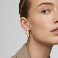 Boucles d'oreilles en anneau avec icône diamant | Or