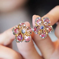 Boucles d'oreilles avec des zirconias multicolores en argent sterling