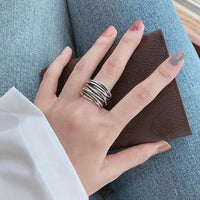 Bague ajustable en couches argentées