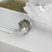 Bague ajustable en couches argentée