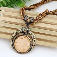 Collier vintage avec pendentif ethnique en cristal vert
