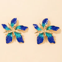 Boucles d'oreilles «Fleur Heureuse» avec Cristaux Bleus