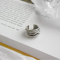Bague ajustable en couches argentées