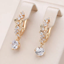 Boucles d'oreilles élégantes en zirconium doré