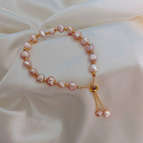 Bracelet de perles roses en or
