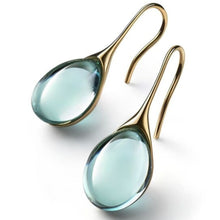 Boucles d'oreilles en cristal pendantes en or et argent