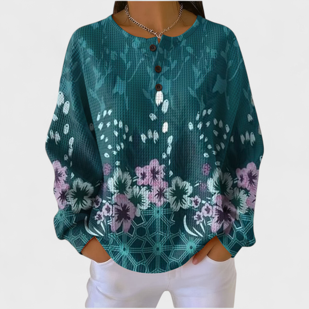 Nora - Pull couleur pétrole au design floral